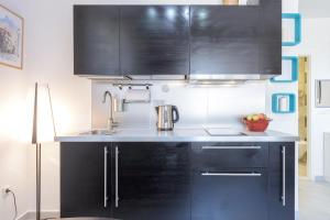 Kuchyň nebo kuchyňský kout v ubytování Apartment MiNo