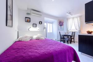 Posteľ alebo postele v izbe v ubytovaní Apartment MiNo