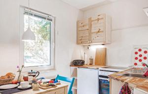 Kuchyň nebo kuchyňský kout v ubytování Ferienwohnung Rheinsberg