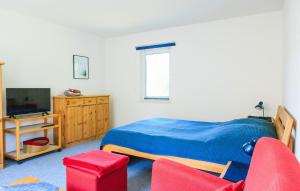 TV a/nebo společenská místnost v ubytování Ferienwohnung Rheinsberg
