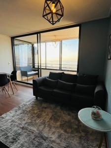 Ruang duduk di Agua Santa Apartment