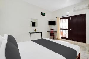 Hotel O Ocean Queen Palace Hotel客房内的一张或多张床位
