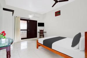 Hotel O Ocean Queen Palace Hotel客房内的一张或多张床位