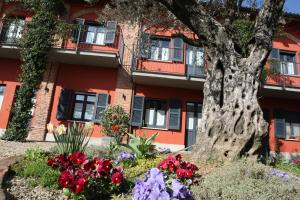 Vonkajšia záhrada v ubytovaní Le Serre Suites & Apartments