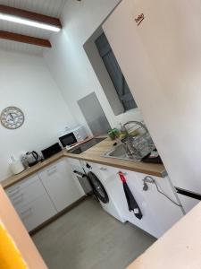 Kuchyň nebo kuchyňský kout v ubytování La Chambre Efrika