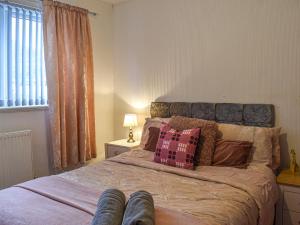 Ένα ή περισσότερα κρεβάτια σε δωμάτιο στο Britannic Chambers Apartment +5 φωτογραφίες