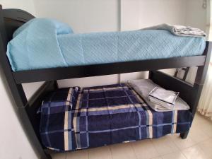 Postel nebo postele na pokoji v ubytování Residence FasMin B&B Nayon experience boxing
