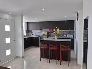 Kuchyň nebo kuchyňský kout v ubytování Residence FasMin B&B Nayon experience boxing