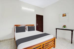 Hotel O Ocean Queen Palace Hotel客房内的一张或多张床位