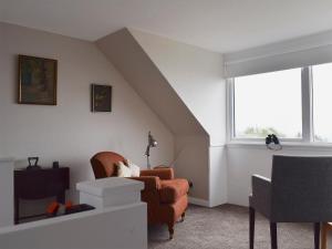 Posezení v ubytování Kannier Cottage + 13 fotografií