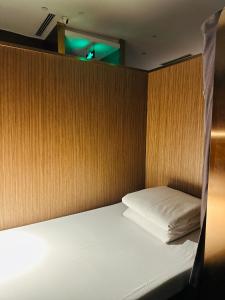 Postel nebo postele na pokoji v ubytování Take a nap hotel