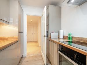 Η κουζίνα ή μικρή κουζίνα στο Luxury Moffat Apartment