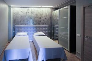 A bed or beds in a room at Villa Oldrado