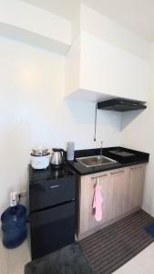 Kuchyň nebo kuchyňský kout v ubytování 1-Bedroom Casa Sophia Tower