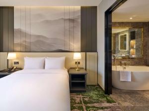 Grand Mercure Imperial Palace Seoul Gangnamにあるベッド