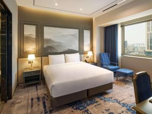 Grand Mercure Imperial Palace Seoul Gangnamにあるベッド