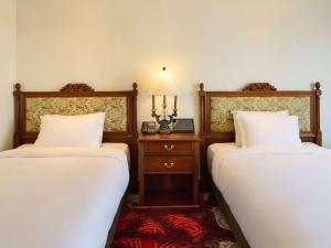 Grand Mercure Imperial Palace Seoul Gangnamにあるベッド