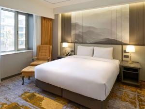 Grand Mercure Imperial Palace Seoul Gangnamにあるベッド