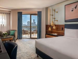 Postel nebo postele na pokoji v ubytování Sofitel Cairo Downtown Nile + 37 fotografií