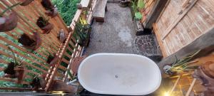 an overhead view of a toilet in a garden at Wisnu Lumbung Uluwatu in Uluwatu