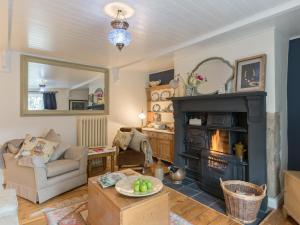 Χώρος καθιστικού στο Brewery House Cottage
