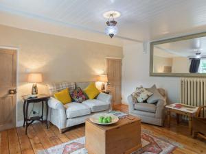 Χώρος καθιστικού στο Brewery House Cottage