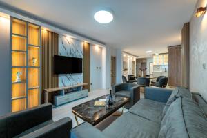 Et tv og/eller underholdning på Santa Maria Luxury Suits + 46 billeder