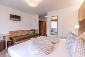 A bed or beds in a room at Vizensn Living