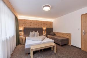 A bed or beds in a room at Vizensn Living
