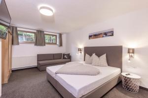 A bed or beds in a room at Vizensn Living