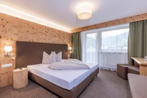 A bed or beds in a room at Vizensn Living Még 24 kép