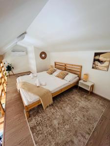 Postel nebo postele na pokoji v ubytování Apartmán MiLoo