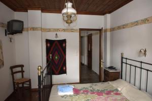Posteľ alebo postele v izbe v ubytovaní Vera's Traditional House