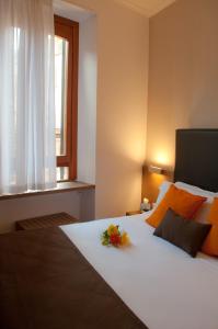 Letto o letti in una camera di Hotel Concordia