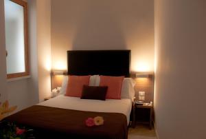 Letto o letti in una camera di Hotel Concordia