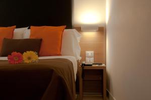Letto o letti in una camera di Hotel Concordia