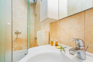 a bathroom with a sink and a shower at Apartment Lujak in Koločep +41 photos