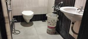 Koupelna v ubytování Hotel Vishal + 5 fotografií