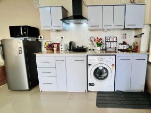 Köök või kööginurk majutusasutuses Aizawl Guest House Apartments