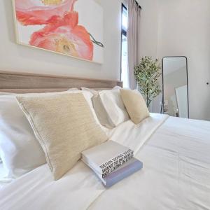 Postel nebo postele na pokoji v ubytování Mango Villa