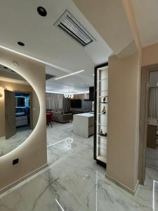 Et tv og/eller underholdning på Callie luxury apartments