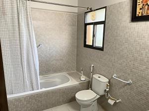 Et badeværelse på Home away from Home