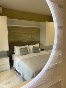 Postel nebo postele na pokoji v ubytování Evelina Luxury Suites in Corfu