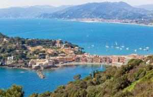 a town on the shore of a large body of water at Nice Apartment In Sestri Levante in Sestri Levante