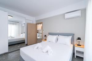Voodi või voodid majutusasutuse Olympiada Residential Complex & Villas toas