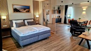 Postel nebo postele na pokoji v ubytování Hotel Zur Mühle
