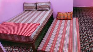 Ένα ή περισσότερα κρεβάτια σε δωμάτιο στο Shree chendur Rooms stay