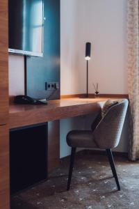 Kuchyň nebo kuchyňský kout v ubytování Ambienthotel Tassilo