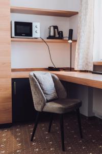 Kuchyň nebo kuchyňský kout v ubytování Ambienthotel Tassilo