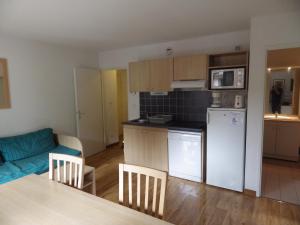 A kitchen or kitchenette at Appartement Ramel Luchon